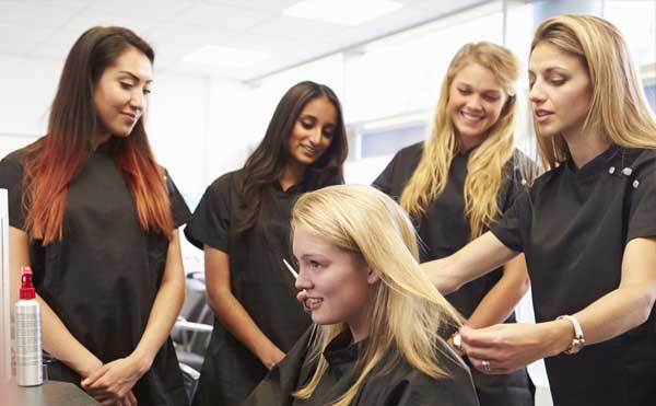 Hairstyling instructor and students